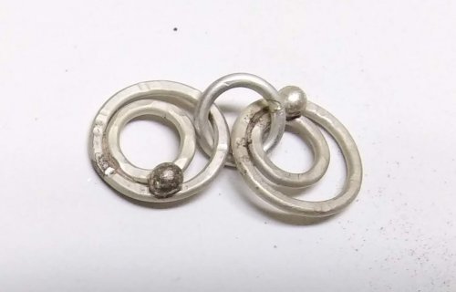 Judy Larson's Making Chain with Wubbers and Wire - , Contemporary Wire Jewelry, Making Chain, Chain Making , Butane Torch, Soldering, Solder, Connect the smaller bracelet links using jump rings made 